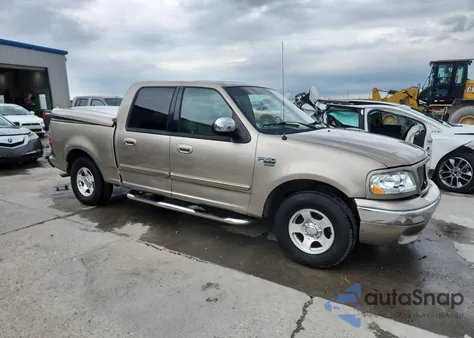 2002 Ford F150 Supercrew из США, поврежденный, VIN 1FTRW07672KB72839